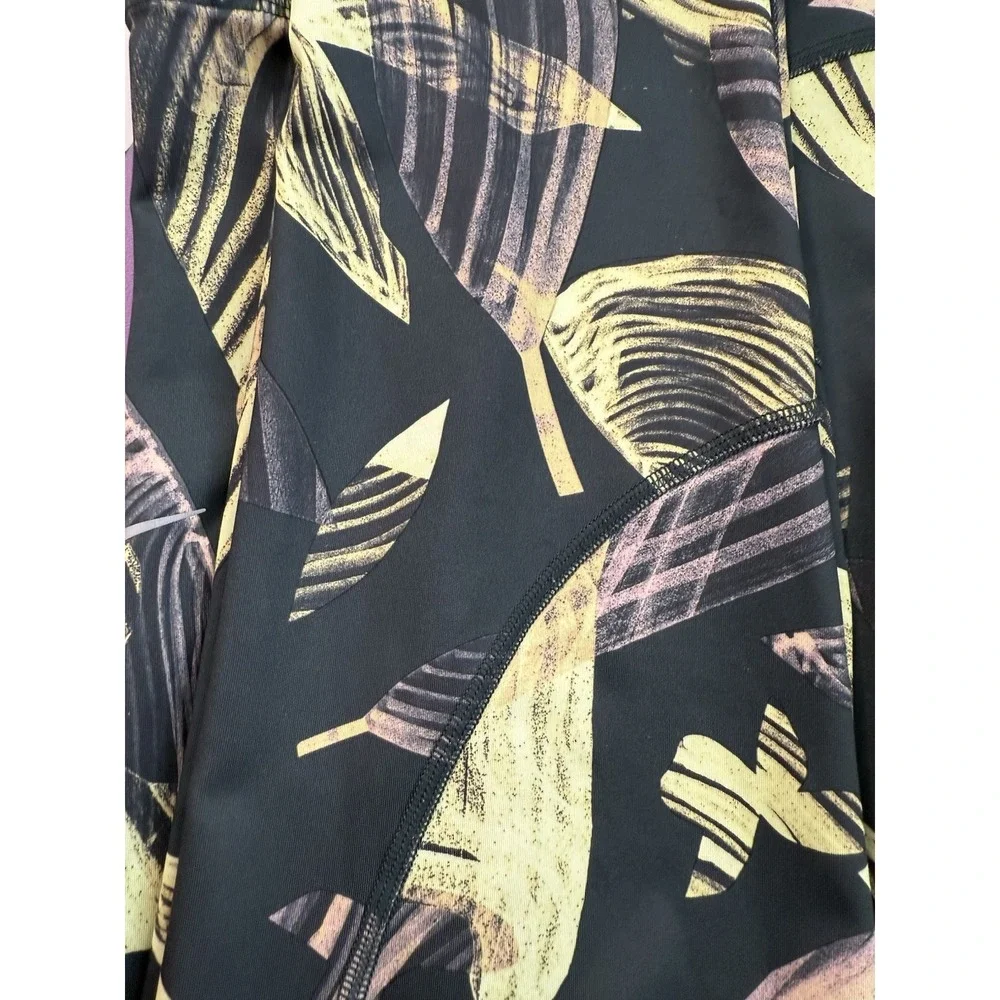 Nike‎ Yoga Dri-Fit Women's Black Yellow Medium Swirl Drawstring Ankle Legging
